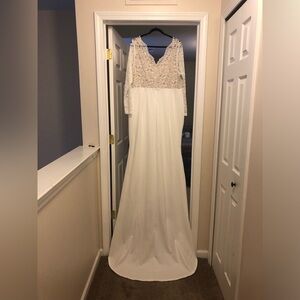 Lost the lbs before the dress showed.